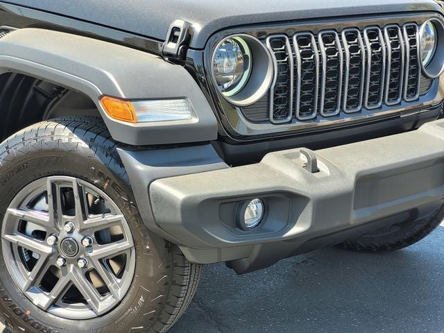 2024 Jeep Wrangler — rear three-quarter view