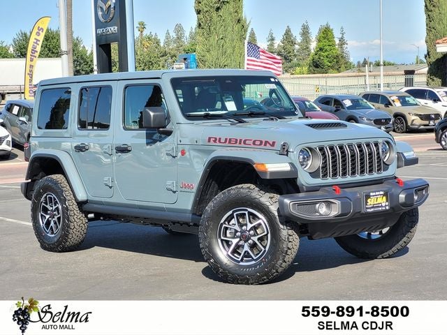 2026 Jeep Wrangler WRANGLER 4-DOOR RUBICON in Anvil Clear-Coat Exterior Paint — front three-quarter view
