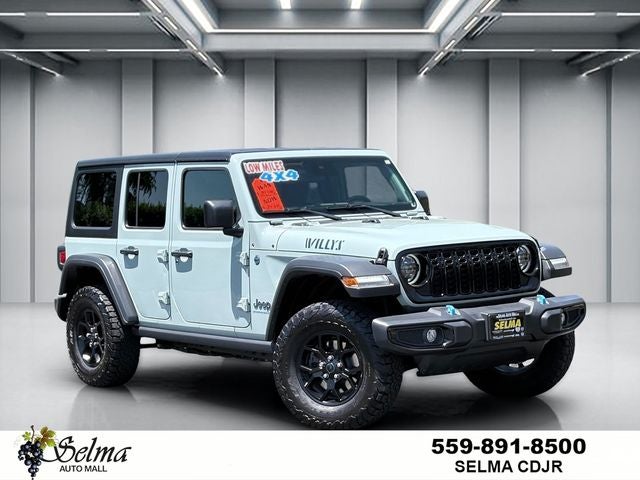 2024 Jeep Wrangler 4xe Willys 4xe in Earl Clearcoat — front three-quarter view
