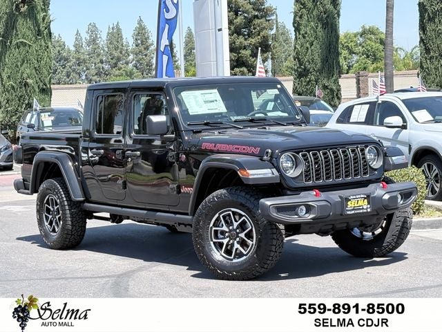 2026 Jeep Gladiator GLADIATOR RUBICON 4X4 in Black Clear-Coat Exterior Paint — front three-quarter view