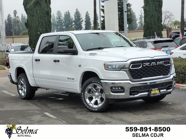 2026 RAM Ram 1500 RAM 1500 BIG HORN CREW CAB 4X4 5'7' BOX in Bright White Clear-Coat Exterior Paint — front three-quarter view