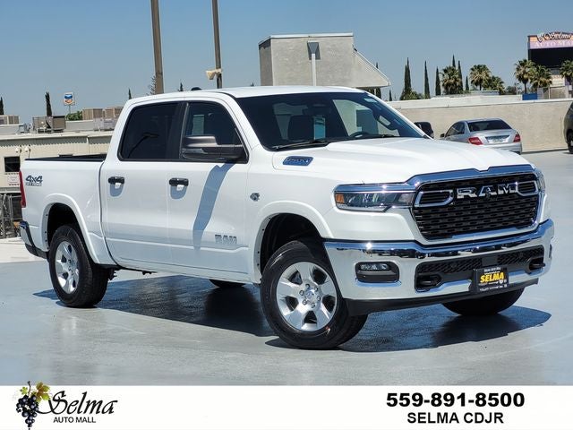 2026 RAM Ram 1500 RAM 1500 BIG HORN CREW CAB 4X4 5'7' BOX in Bright White Clear-Coat Exterior Paint — front three-quarter view