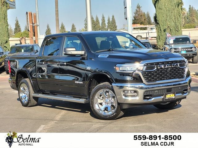2026 RAM Ram 1500 RAM 1500 BIG HORN CREW CAB 4X4 5'7' BOX in Diamond Black Crystal Pearl-Coat Exterior Paint — front three-quarter view