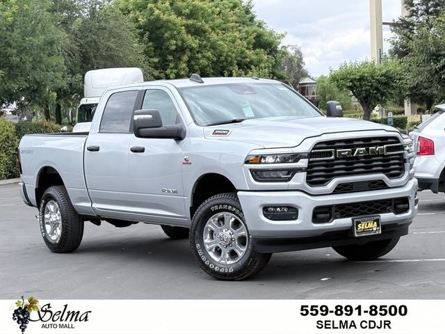 2026 RAM Ram 3500 RAM 3500 BIG HORN CREW CAB 4X4 6'4' BOX in Silver-Zynith Exterior Paint — front three-quarter view