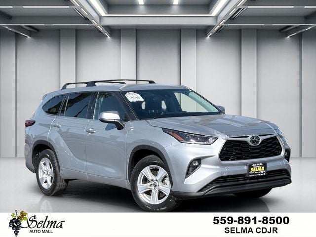 2021 Toyota Highlander LE in Celestial Silver Metallic — front three-quarter view