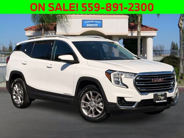 2023 GMC Terrain SLT in Summit White — front three-quarter view
