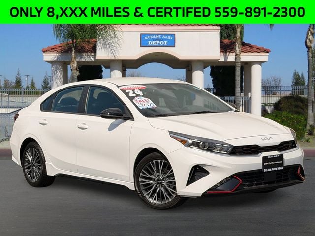 2024 Kia Forte GT-Line in Snow White Pearl — front three-quarter view
