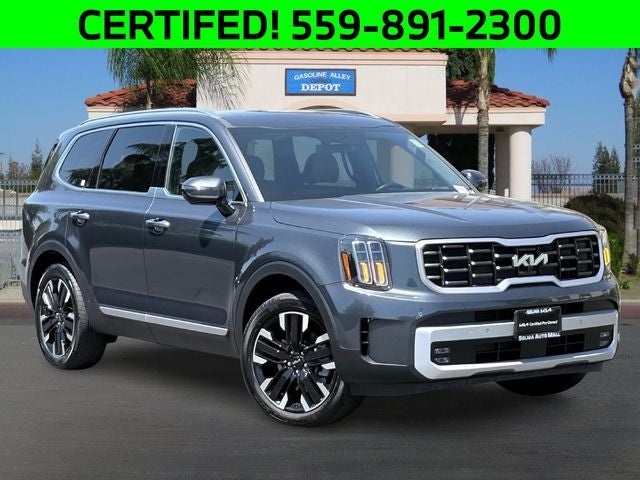 2024 Kia Telluride SX in Gravity Gray — front three-quarter view