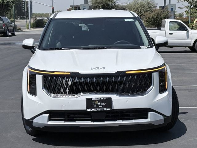 2026 Kia Carnival Hybrid — side profile view