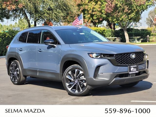 2026 Mazda Mazda CX-50 Hybrid Premium Plus AWD in Polymetal Gray Metallic — front three-quarter view