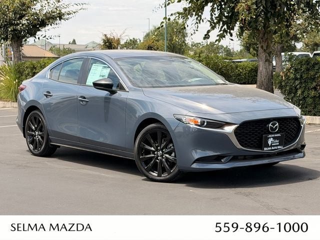 2026 Mazda Mazda3 Sedan 2.5 S Carbon Edition AWD in Polymetal Gray Metallic — front three-quarter view