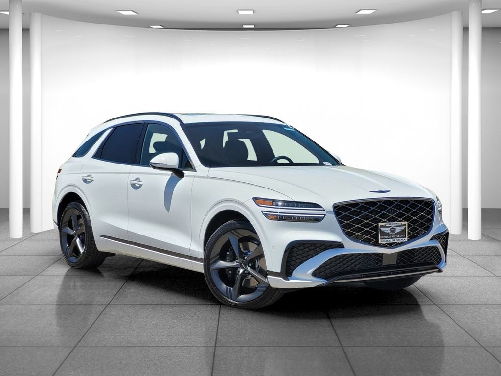 2026 Genesis GV70 3.5T SPORT PRESTIGE in White — front three-quarter view