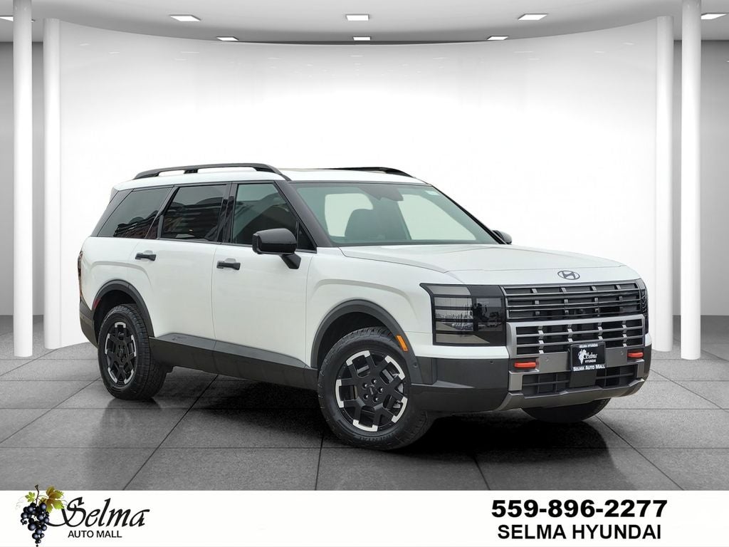 2026 Hyundai Palisade XRT Pro in White Pearl — front three-quarter view