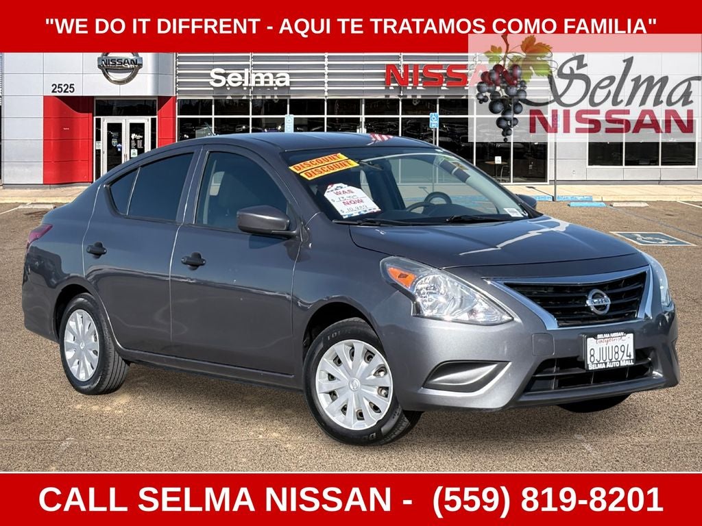 2019 Nissan Versa 1.6 S Plus in Gun Metallic — front three-quarter view