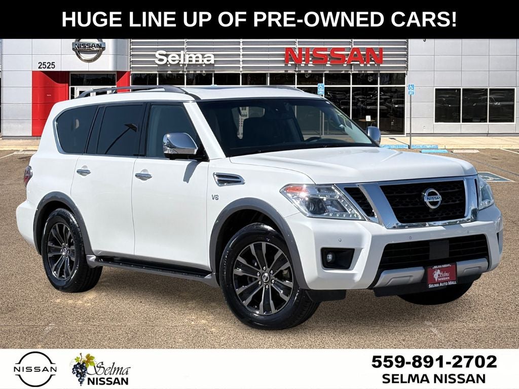 2017 Nissan Armada Platinum in Pearl White — front three-quarter view
