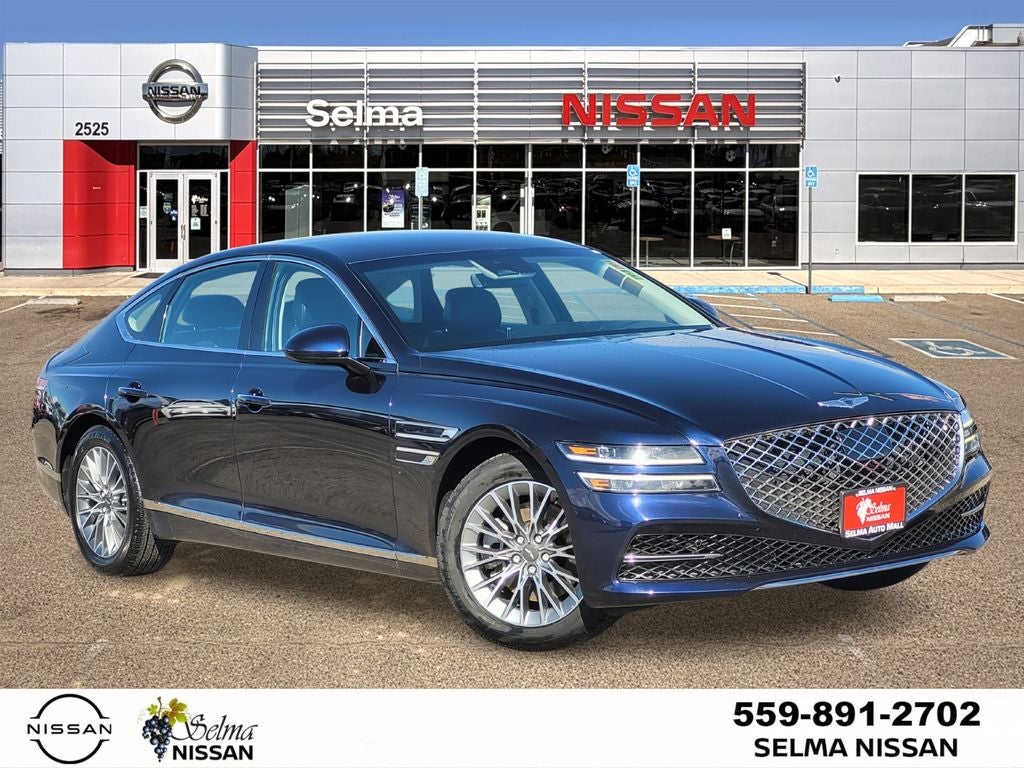 2023 Genesis G80 2.5T in Capri Blue — front three-quarter view